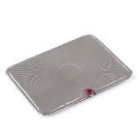 A rectangular silver double postage stamp case, with sliding action, cabochon garnet thumb piece,