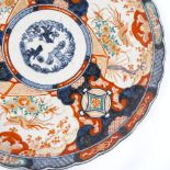A large Chinese porcelain Imari pattern charger, hand painted and gilded decoration, diameter