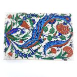 A Turkish Islamic painted pottery tile, 24cm x 17cm