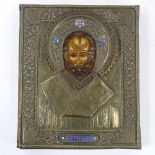 A Russian relief moulded brass-framed icon, with inset painted panel and small enamel mounts, 29cm x