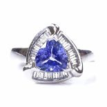 An 18ct white gold tanzanite and diamond cluster ring, set with trillion-cut tanzanite and