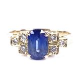 A 14ct gold sapphire dress ring, with stepped diamond set shoulders, sapphire approx 1ct, size H,