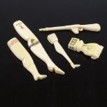 5 various Victorian carved ivory seals and pipe tampers, in the form of lady's legs, a rifle, and