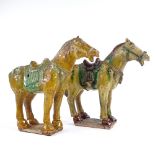 A pair of Chinese Tang style green/brown glaze terracotta horses, height 20cm, in silk-lined