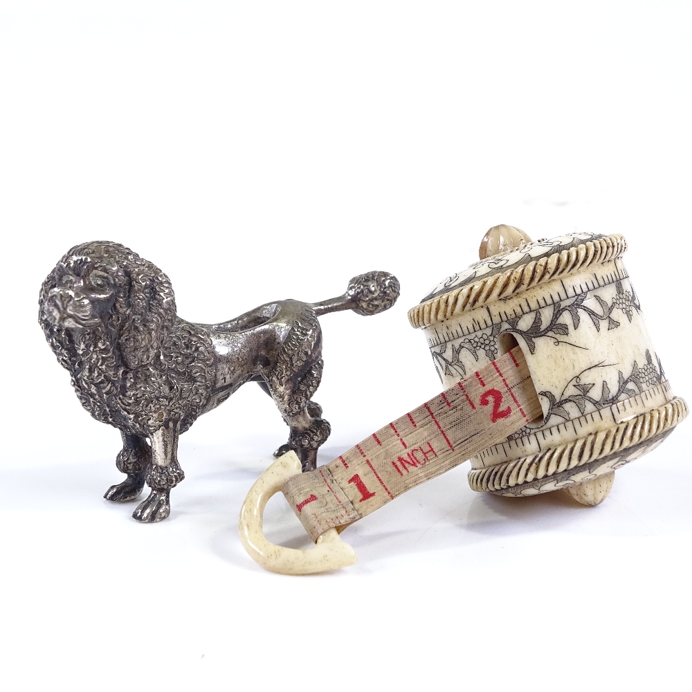 An Edwardian cast-silver Poodle design pin cushion (no cushion), length 6.5cm, and an engraved