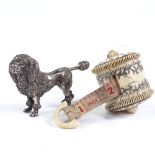 An Edwardian cast-silver Poodle design pin cushion (no cushion), length 6.5cm, and an engraved