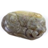A Chinese relief carved jade beast, length 6cm