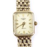 ROTARY - a lady's 9ct gold quartz wristwatch, champagne dial with gilded baton hour markers on 9ct