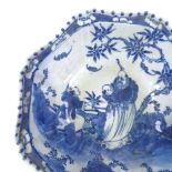 A Chinese blue and white porcelain octagonal bowl with hand painted figures in gardens, 25cm across