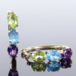 A pair of 9ct gold peridot blue topaz and amethyst hoop earrings, earring height 19.9mm, 1.5g