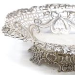 A Victorian silver bon bon dish, with relief embossed ribbon and floral decoration, by Levi &