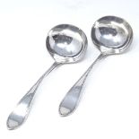 A pair of Victorian silver ladles, with engraved bordered handles, by Walker & Hall, hallmarks