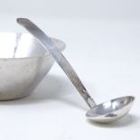 A modernist silver bowl and spoon, with planished decoration, by Brian Simpson, hallmarks London