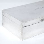 A rectangular silver cigarette case, by Henry Hodson Plante, hallmarks Birmingham 1932, length 18cm