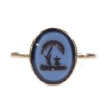 An unmarked gold intaglio carved sardonyx memorial seal ring, depicting urn under tree, setting