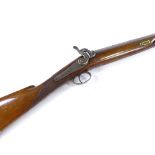 An Antique percussion rifle