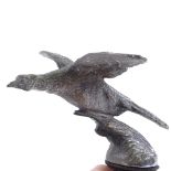 An early 20th century nickel plate bronze pheasant design car mascot, length 12cm