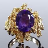A modernist 9ct gold amethyst abstract ring, maker's marks HB, setting height 23.1mm, size M, 9.3g