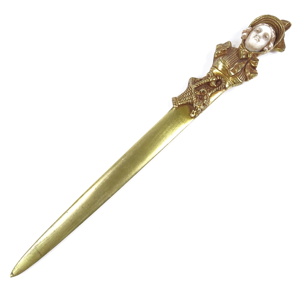A French gilt-bronze paper knife, circa 1900, the handle in the form of a lady's head with carved - Image 2 of 3
