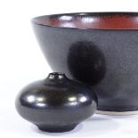 A Studio pottery bowl by Suleyman Saba, diameter 21cm, and a small Swedish pot circa 1960s signed