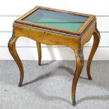 A 19th century maple and kingwood vitrine table, with ormolu mouldings and mounts, and cabriole