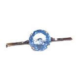 A 14ct gold large blue spinel bar brooch, spinel diameter 17.6mm, brooch length 57.9mm, 8.1g