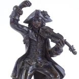 A patinated bronze sculpture of a man playing a violin, black marble plinth, unsigned, height 20cm