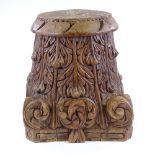 A large ornamental carved hardwood column capitol, height 46cm, width 40cm