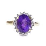A 9ct gold amethyst and diamond cluster ring, setting height 13.5mm, size P, 3g