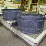 A pair of large heavy circular lead garden planters, diameter 29", height 15"