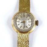 ZENITH - a lady's 18ct gold mechanical wristwatch, silvered dial with baton hour markers, on 18ct