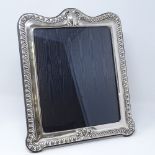 A modern large Britannia standard silver-fronted photo frame, with fluted border, by Paul Vernon