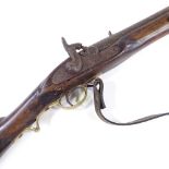 An Antique percussion rifle