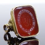 An Edwardian 9ct gold intaglio carved carnelian seal fob, with motto "Dum Spiro Spero", fob height