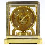 A Jaeger Lecoultre Atmos clock, gilt-brass case with glass panels, working order
