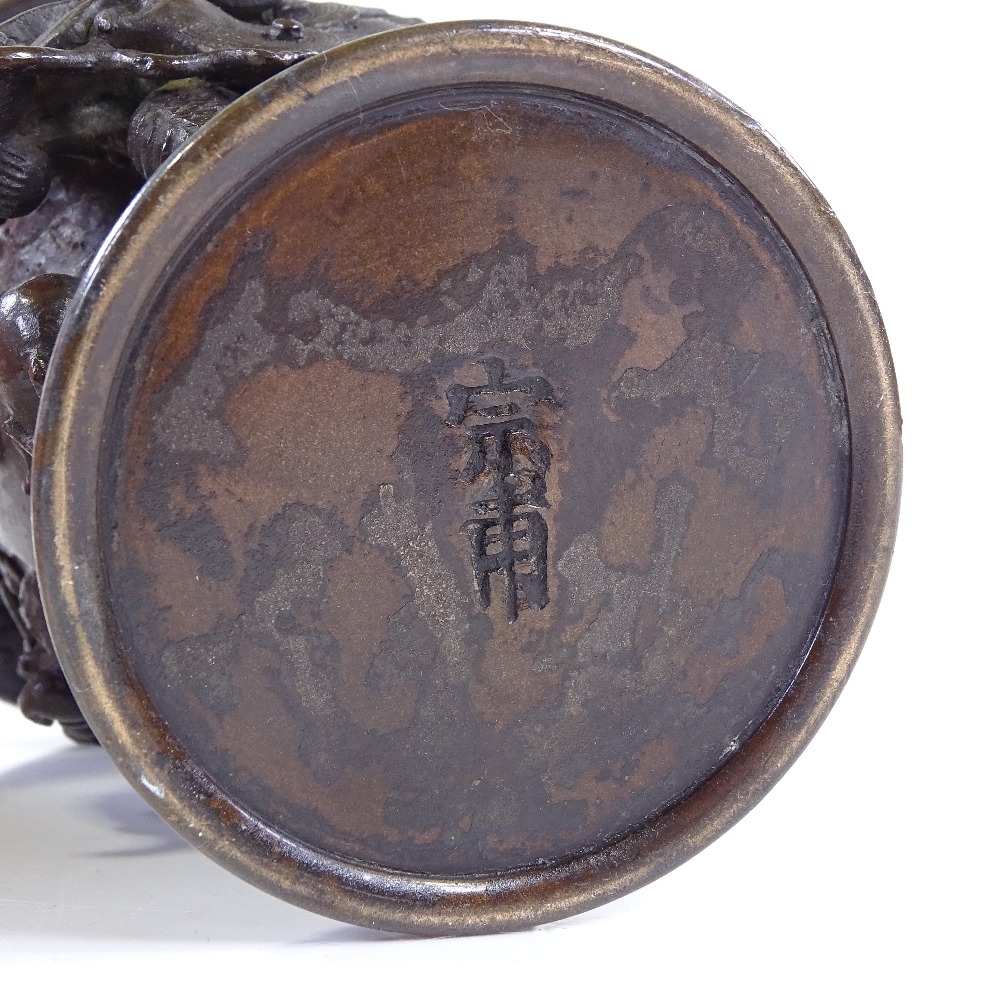 A Japanese patinated bronze vase with cast dragon entwined body, signed under base, height 13.5cm - Image 3 of 3