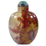 An Antique Chinese plume agate snuff bottle, with opaque oxide deposits, original jade-mounted