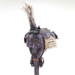 An African Dan Tribal carved wood bird mask, with raffia, beadwork, and bird feather mounts, overall