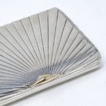 A Danish sterling silver sunburst hinged cigarette case/snuffbox, with gold thumb piece, by Axel
