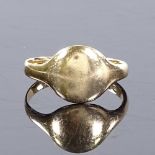 An 18ct gold signet ring, with plain central panel, setting height 10mm, size K, 3.1g