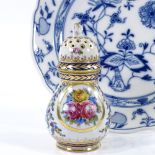 A Sevres style painted and gilded porcelain sugar caster, height 11cm, and a Meissen blue and