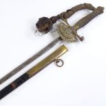 A Victorian dress sword with etched blade, signed Scott Son & Claxton of New Bond Street London,