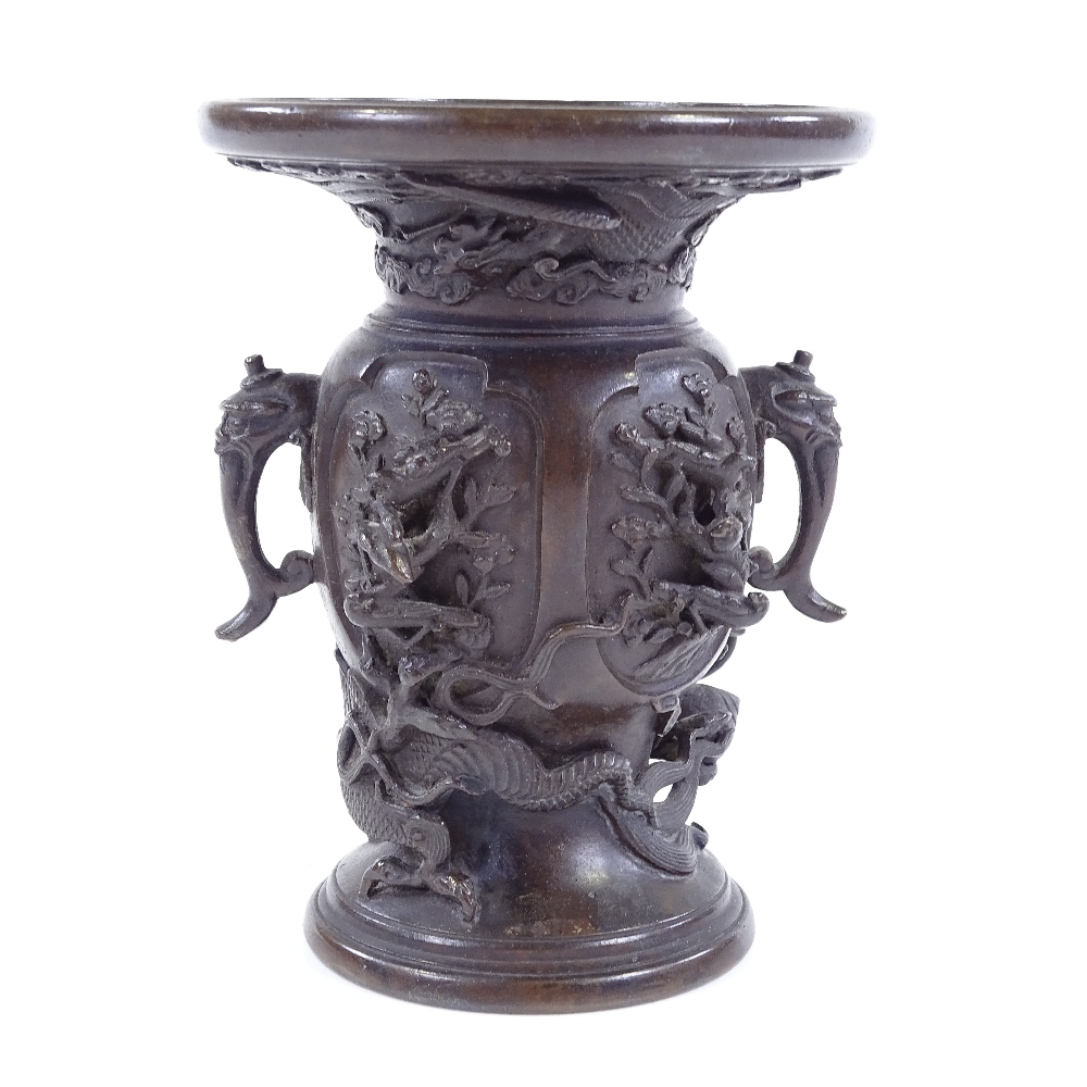 A Japanese patinated bronze vase with cast dragon entwined body, signed under base, height 13.5cm - Image 2 of 3