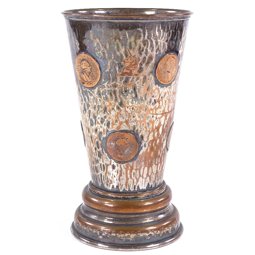 An unusual silver plate on copper gaming cup, with inset coins and dice behind glass panel under the