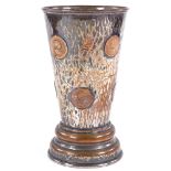 An unusual silver plate on copper gaming cup, with inset coins and dice behind glass panel under the