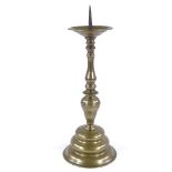 A 17th century bronze pricket candle stand, height overall 44cm