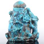 An Antique Chinese turquoise matrix snuff bottle, carved from a single piece of turquoise, decorated
