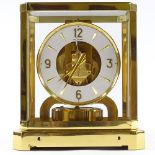 A Jaeger Lecoultre Atmos clock, gilt-brass case with glass panels, recently serviced, with