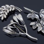 An Anton Michelsen Danish sterling silver mistletoe brooch, together with 2 similar stylised