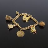 A 9ct gold curb link heart-lock charm bracelet, with 6 gold charms, 31.7g